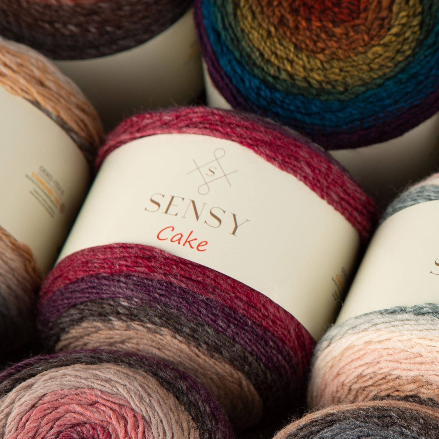 Sensy Cake Yarn, 5.3 oz, 525 Yards, Gauge 3 Light: 559 / 1 Skein